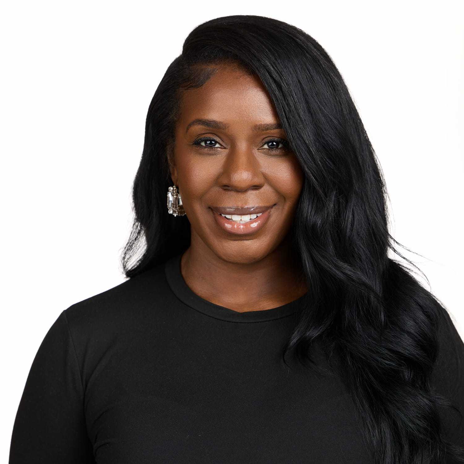 Portrait of Josephine White, a professional stylist at Cole Stevens Salon, showcasing their expertise and style.