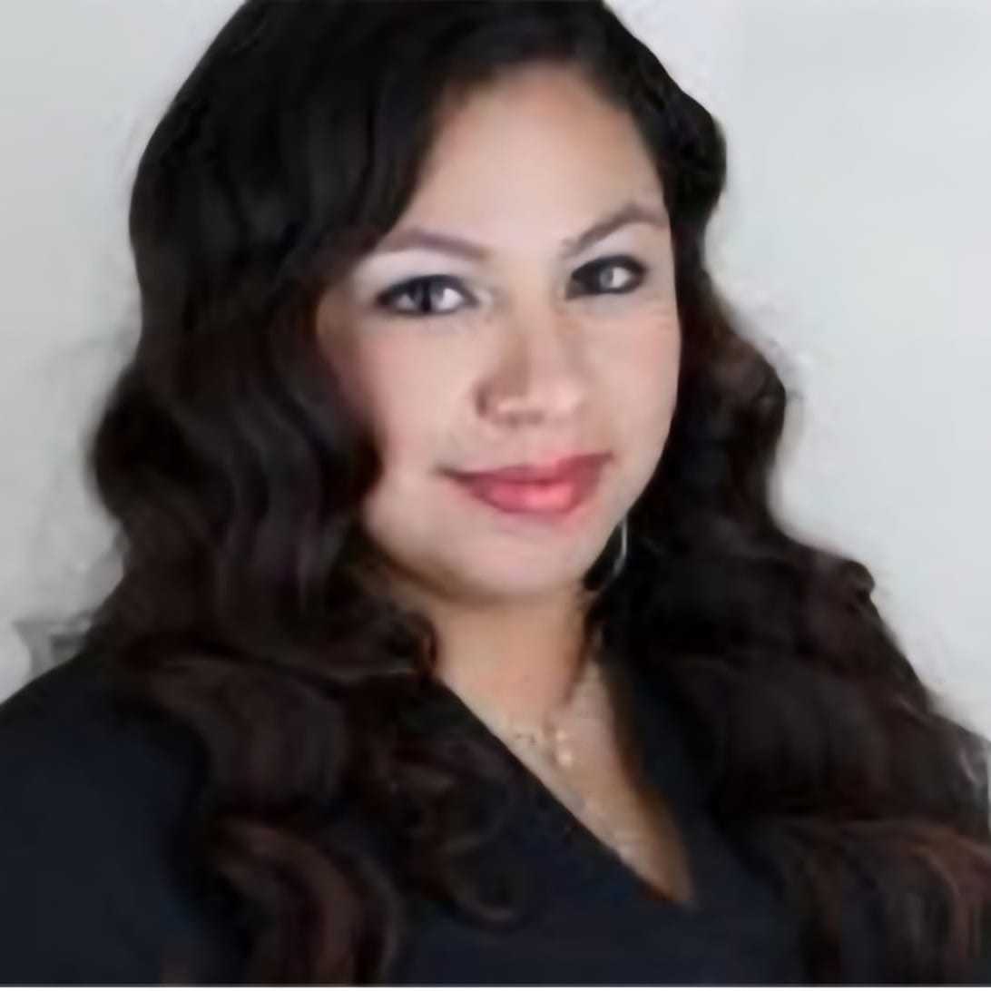 Portrait of Brenda Arias, a professional stylist at Cole Stevens Salon, showcasing their expertise and style.